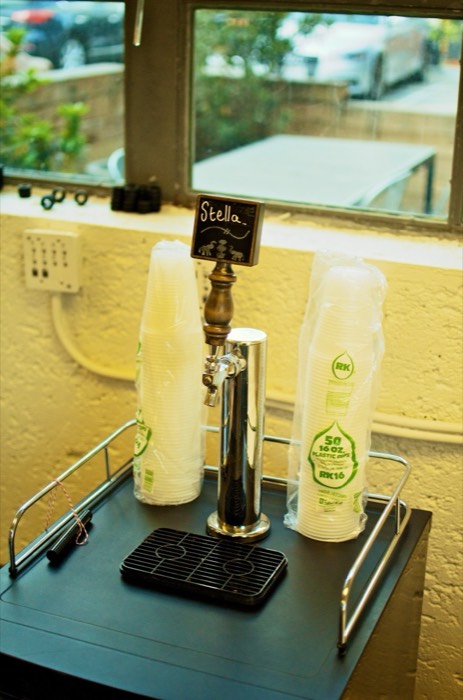 The kegerator with a Stella chalkboard sign, from the meetup's photo album